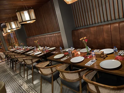 Dining tables and banquette at Seminyak