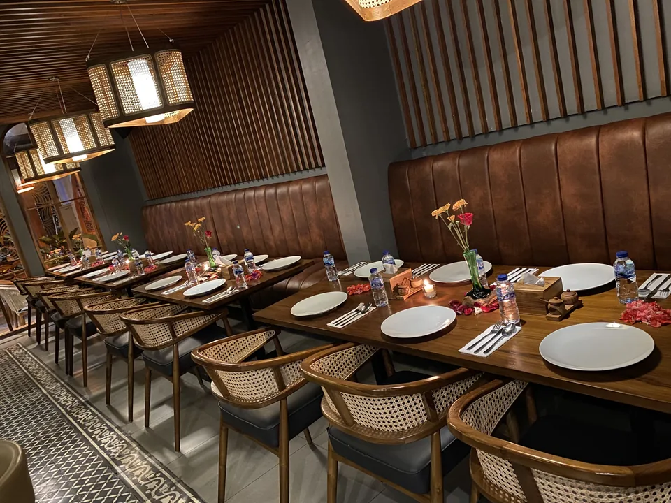 Dining tables and banquette at Seminyak